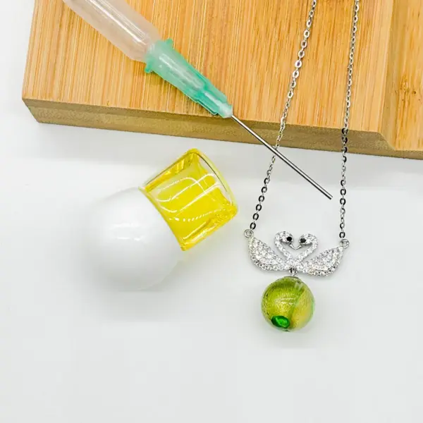 Sterling Silver Twin Swan Aroma Necklace - Gold Green | Energy & Healing | Diffuse on the go